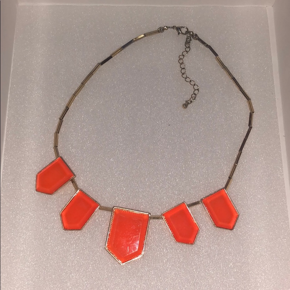 Fashion necklace. Orange colour with gold chain